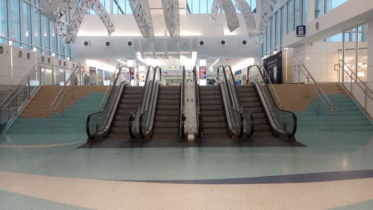 JAX airport arrivals escalators to limo pickup