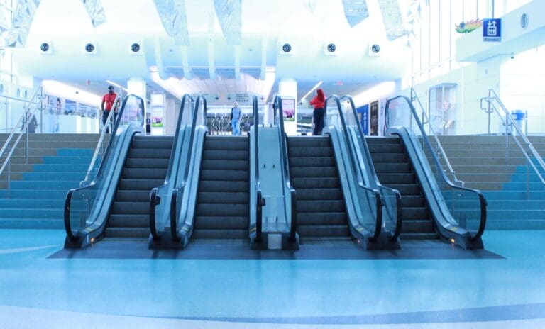 Escalators up heading to baggage claim in JAX for ground transport pickup