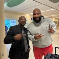 Rick Ross with jacksonville black car limo service chauffeur