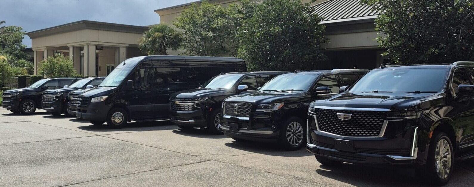 Jacksonville Fleet showing Sprinter Van and black car suv for FAQ page