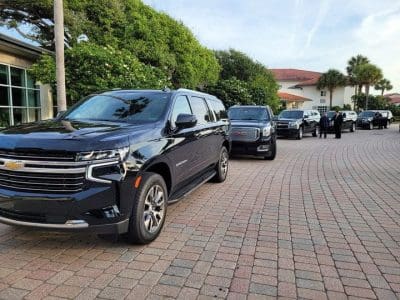 JBCL Car Service Limos at group charity event Jacksonville Black Car Limo Service FAQ Fleet Pickup Photo